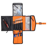 Tool roll fully laid out with tools to demonstrate function