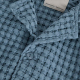 Close up of collar and uppermost button