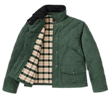 A dark green quilted coat with a beige and green flannel lining on a flat white background