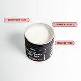 Open container of conditioning cream and list of selling points: conditions hair, enhances curls, and reduces frizz.