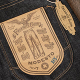 Close up on tag on Modesto pair of denim
