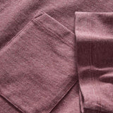 Close up of chest pocket and hem on sleeve