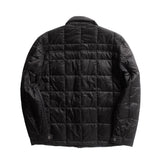 Backside view of a black puffy jacket on a flat white background