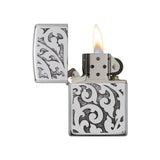 Filigree Zippo Lighter open and lit