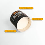 Open jar of pomade and list of selling points: water-resistant, strong hold, and high shine.