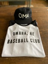 Fontenelle Omaha Baseball Tee Folded and displayed with baseball hat