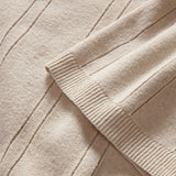 Close up of fabric and sleeve hem