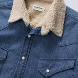 Close up of upper portion of garment to show collar, buttons, and chest pocket