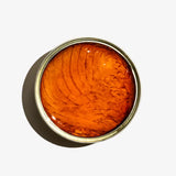 Open tin to show tuna