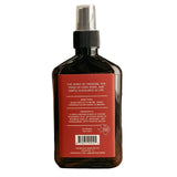 Back of bottle with text [Directions: shake bottle to blend. Spray overhead in any room as needed. Ingredients: a highly refined blend of custom fragrance oils including notes of bourbon vanilla, bergamot, and sandalwood with purified water.]