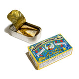 Package next to open tin of fish