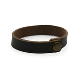 Dark brown wrist wrap with antique brass snap